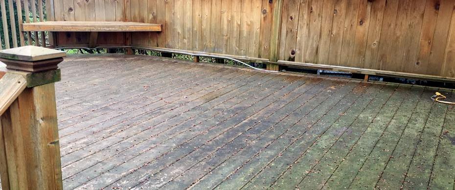 deck cleaning service in grand rapids michigan uses softwashing instead of pressure washing to refinish wood deck